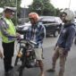 Suasana operasi yang digelar Polri menertibkan kendaraan yang mlenggar aturan lalu lintas.
