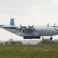 Ilustrasi dan penampakan pesawat Antonov An-22 Antey saat masih beroperasi