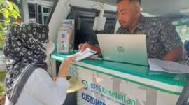 Ilustrasi Peserta BPJS Kesehatan saat bayar tunggakan