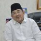 Foto ; Bupati Tanjab Barat, Drs. H. Anwar Sadat, M.Ag, 
