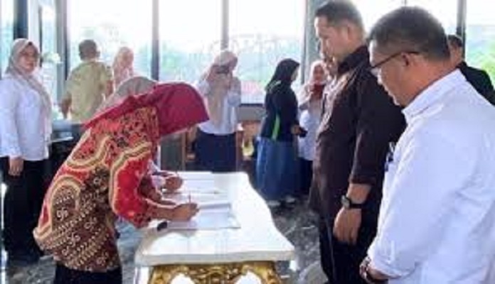 Prosesi penandatangan Mou antara Pemkab Merangin dengan Perbankan dalam rangka memaksimalkan pendapatan daerah