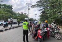 Ilustrasi pelaksanaan razia kendaraan oleh Polisi