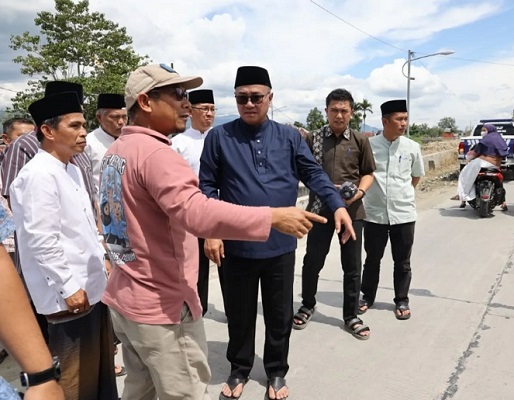 Walikota dan Wakil Walikota Sungai Penuh, Alfin-Azhar saat meninjau pembangunan Spam di Hamparan Rawang