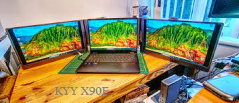 KYY X90E sebuah portable monitor triple screen berukuran 15,6 inci.