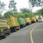 Ilustrasi operasi truk batu bara di jambi.