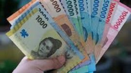 Ilustrasi penukaran uang.