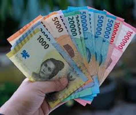 Ilustrasi penukaran uang.