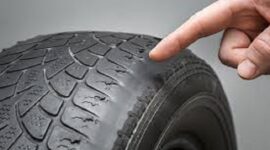 Tanda kerusakan pada Ban mobil.