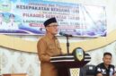 Bupati Sarolangun, H Hurmin saat memimpin kegiatan penandatanganan nota kesepakatan bersama Forum Koordinasi Pimpinan Daerah (Forkopimda) Sarolangun