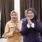 Ketua Tim Penggerak PKK Kota Sungai Penuh, Sri Kartini Alfin saat membuka kegiatan Bimbingan Teknis (Bimtek) Tim Pembina Posyandu 