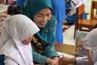 Ketua TP-PKK Sungai Penuh, Sri Kartini Alfin